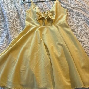 Yellow Sleeveless Dress with Bow Detail